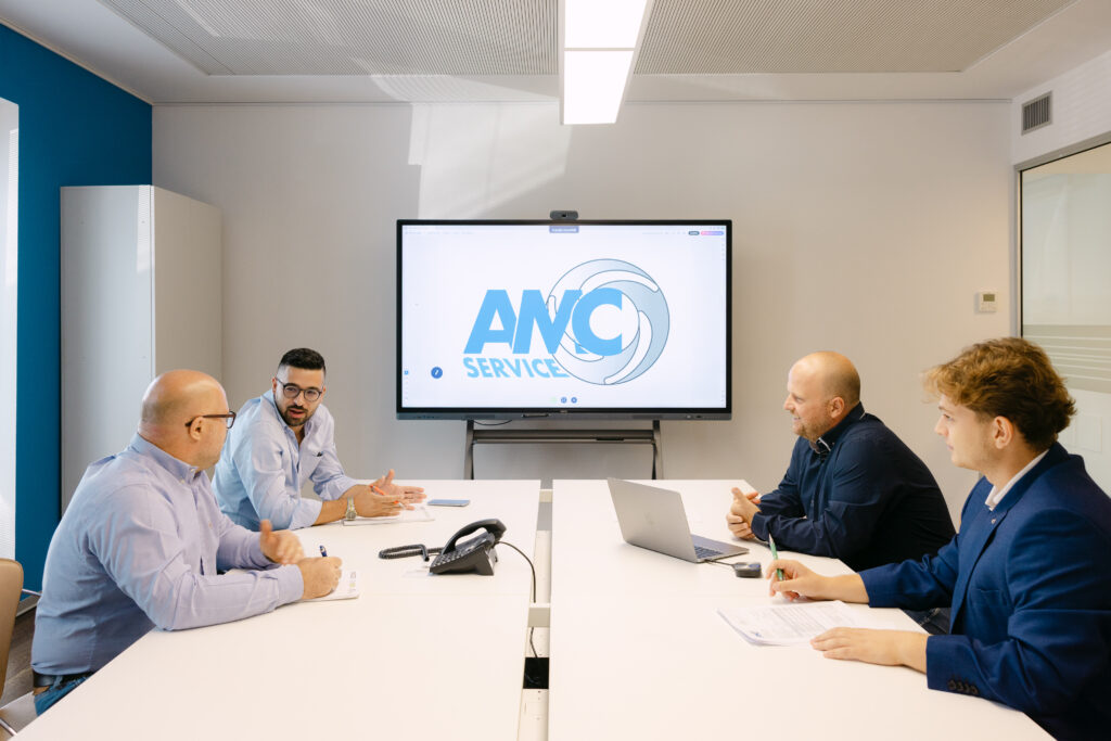 Team direzionale AMC Service in riunione